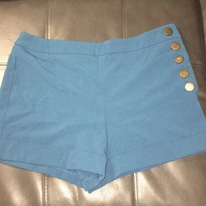 Shorts buttons on the side